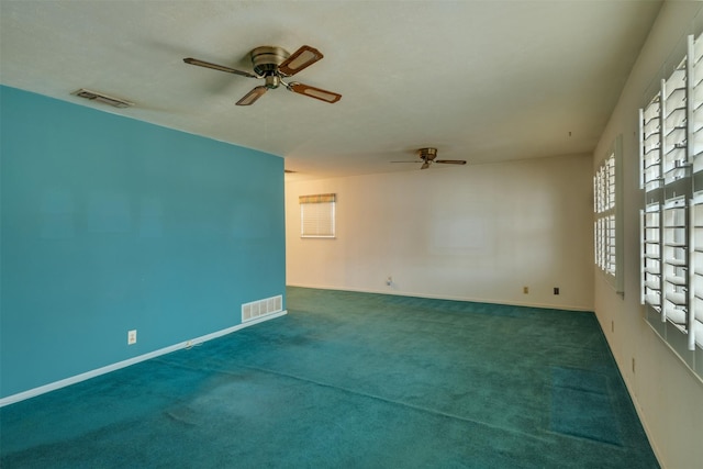 1406 E Cortez Dr, Wichita Falls, TX 76306 - carpeted spare room with ceiling fan and baseboards