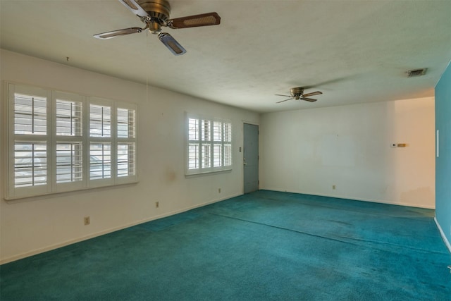 1406 E Cortez Dr, Wichita Falls, TX 76306 - unfurnished room featuring a ceiling fan, carpet floors, and baseboards