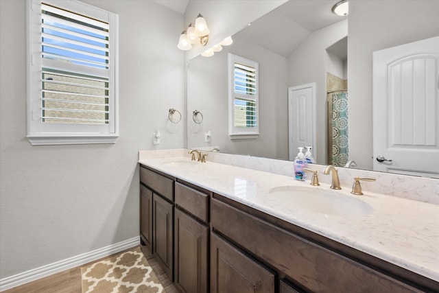 3626 Green Bluff Ct, Midlothian, TX 76065 - full bathroom with baseboards, double vanity, vaulted ceiling, and a shower with shower curtain