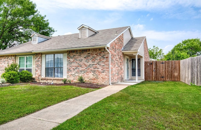 4626 Nervin St, The Colony, TX 75056 - view of front of home with brick siding and a shingled roof