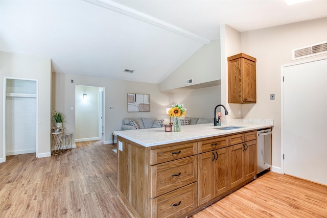 4626 Nervin St, The Colony, TX 75056 - kitchen with a sink, dishwasher, a peninsula, light wood-style floors, and lofted ceiling