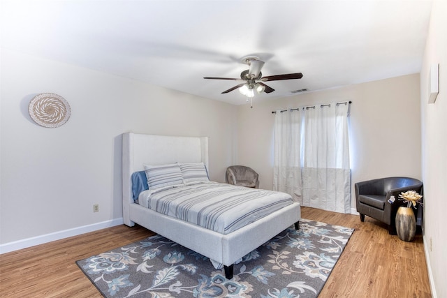 4626 Nervin St, The Colony, TX 75056 - bedroom featuring wood finished floors, baseboards, and ceiling fan