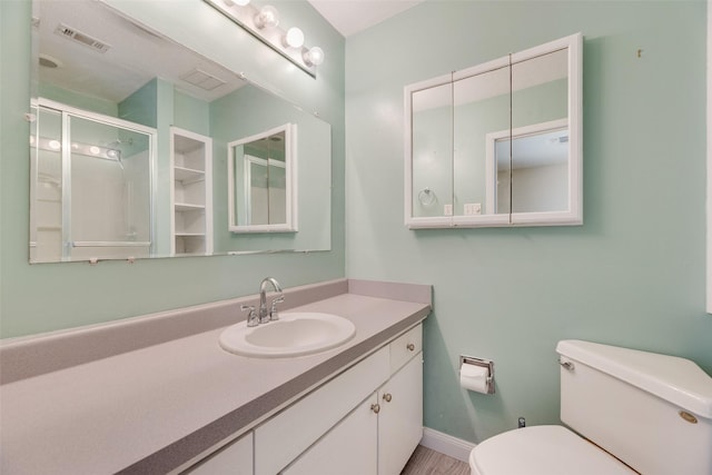 240 N Bryan Pl, Mesquite, TX 75149 - full bath featuring a shower stall, toilet, vanity, and baseboards