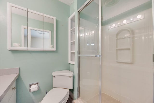 240 N Bryan Pl, Mesquite, TX 75149 - bathroom featuring toilet, a shower stall, and vanity
