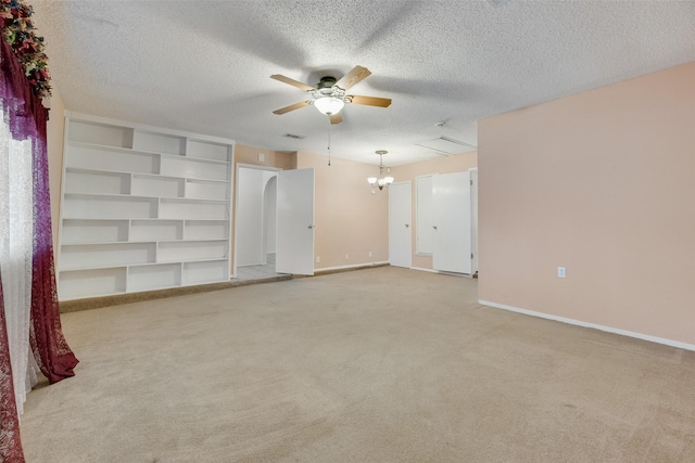 240 N Bryan Pl, Mesquite, TX 75149 - empty room with a ceiling fan, a textured ceiling, light colored carpet, baseboards, and a chandelier