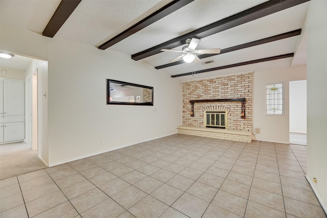 240 N Bryan Pl, Mesquite, TX 75149 - unfurnished living room with a ceiling fan, light tile patterned floors, a fireplace, and baseboards