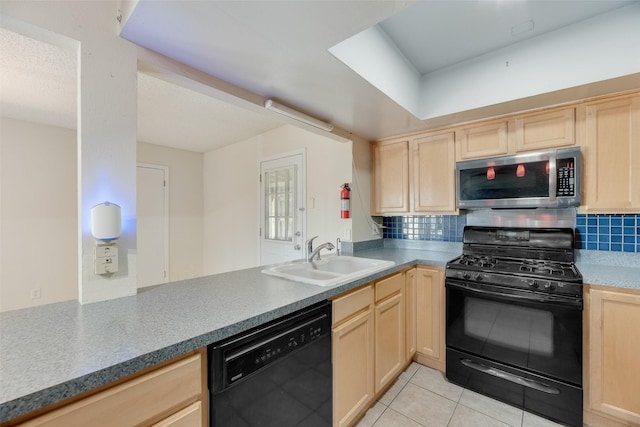 240 N Bryan Pl, Mesquite, TX 75149 - kitchen with black appliances, light brown cabinetry, and a sink