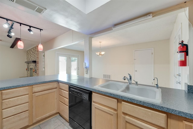 240 N Bryan Pl, Mesquite, TX 75149 - kitchen with black dishwasher, light brown cabinetry, a sink, track lighting, and light tile patterned floors