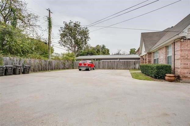 3233 S Univ Dr, Fort Worth, TX 76109 - view of vehicle parking with fence