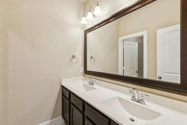 5408 Fairdale Dr, Denton, TX 76207 - full bathroom featuring double vanity and baseboards