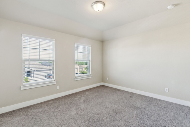 5408 Fairdale Dr, Denton, TX 76207 - empty room featuring carpet floors, baseboards, and a smoke detector