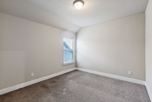 5408 Fairdale Dr, Denton, TX 76207 - carpeted spare room featuring baseboards and lofted ceiling