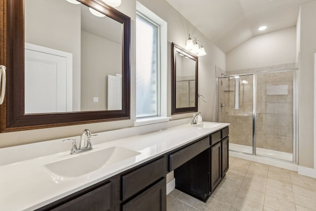 5408 Fairdale Dr, Denton, TX 76207 - bathroom with a shower stall, double vanity, healthy amount of natural light, tile patterned floors, and vaulted ceiling