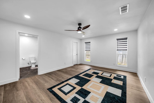 4122 Azalea Ln, Garland, TX 75043 - unfurnished bedroom featuring wood finished floors, recessed lighting, baseboards, ensuite bath, and a ceiling fan