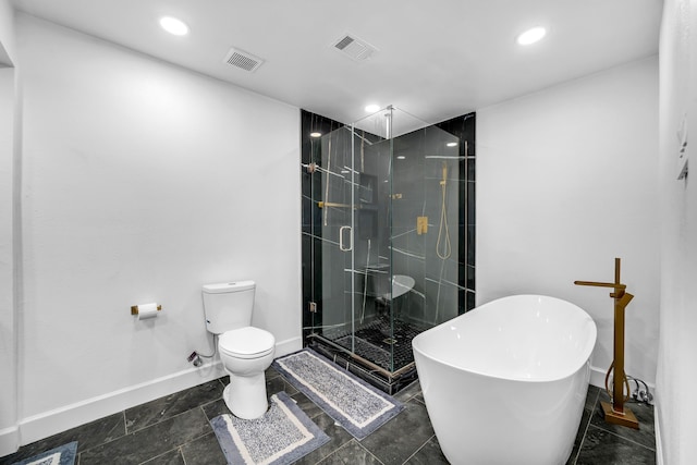 4122 Azalea Ln, Garland, TX 75043 - bathroom featuring toilet, a stall shower, baseboards, recessed lighting, and a soaking tub
