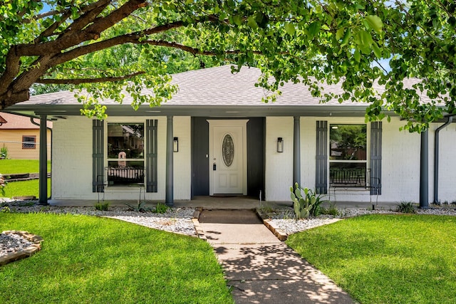 4122 Azalea Ln, Garland, TX 75043 - ranch-style home featuring covered porch and a front yard