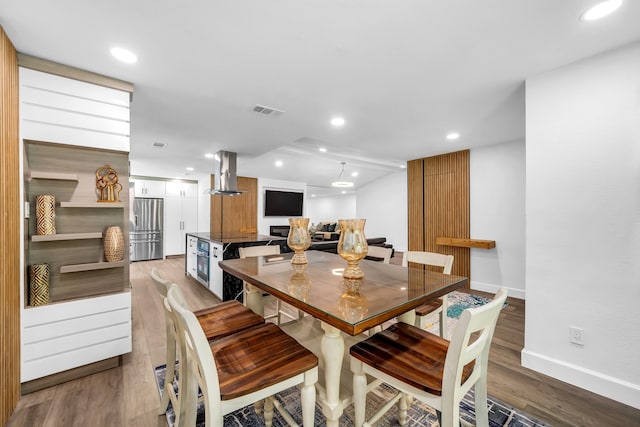 4122 Azalea Ln, Garland, TX 75043 - dining room with baseboards, wood finished floors, and recessed lighting