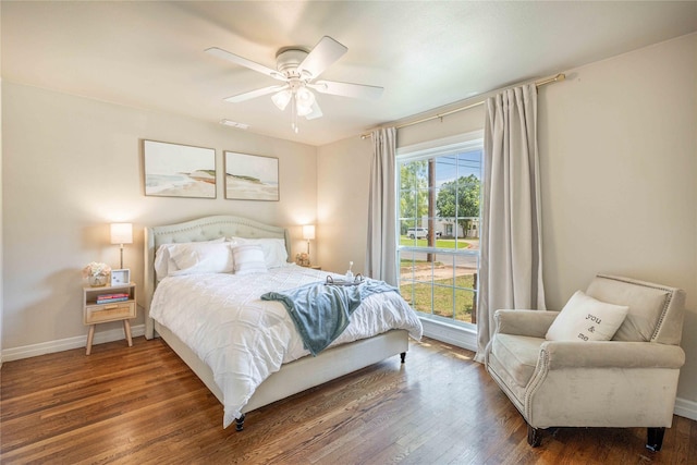 3418 S 11th St, Abilene, TX 79605 - bedroom featuring wood finished floors, baseboards, and a ceiling fan