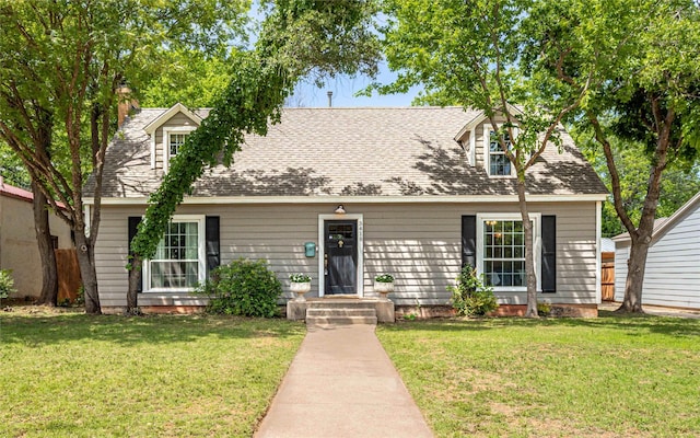 3418 S 11th St, Abilene, TX 79605 - cape cod home featuring a front yard and a shingled roof