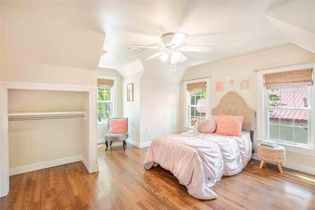 3418 S 11th St, Abilene, TX 79605 - bedroom with vaulted ceiling, wood finished floors, baseboards, and a ceiling fan