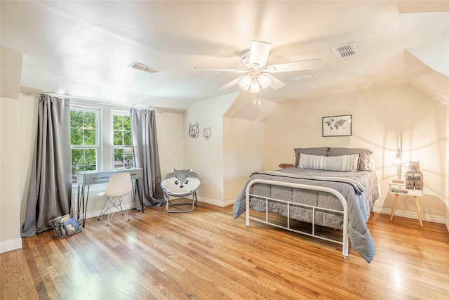 3418 S 11th St, Abilene, TX 79605 - bedroom featuring wood finished floors, baseboards, vaulted ceiling, and a ceiling fan