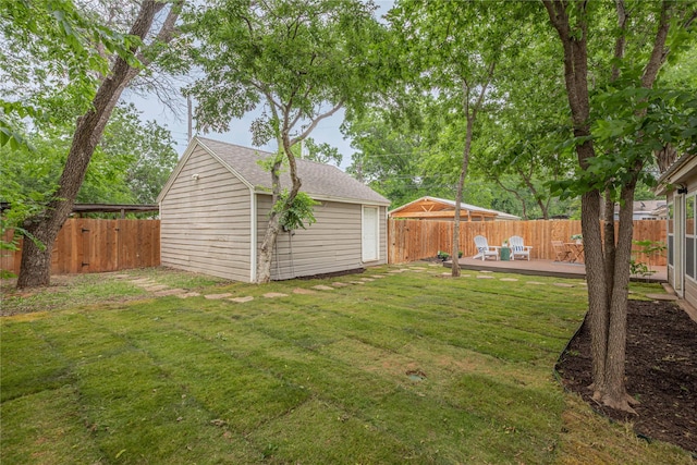 3418 S 11th St, Abilene, TX 79605 - view of yard with a wooden deck and an outdoor structure