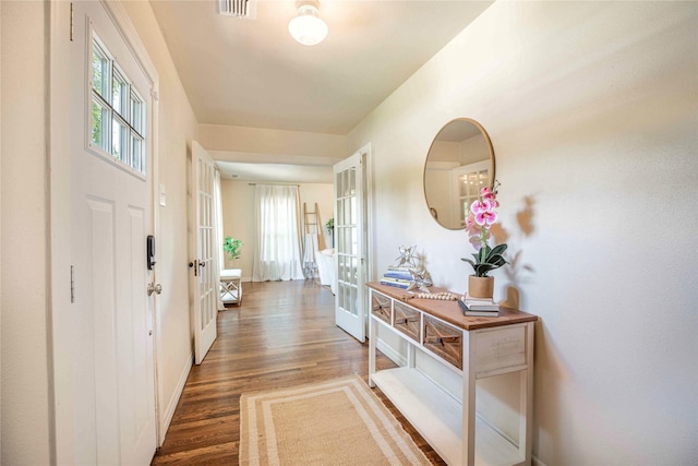 3418 S 11th St, Abilene, TX 79605 - entrance foyer with french doors, wood finished floors, and baseboards