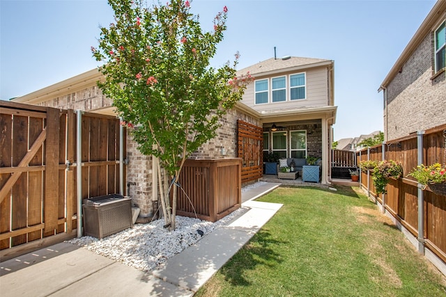 414 Kirkland Rd, Garland, TX 75044 - rear view of house featuring an outdoor living space