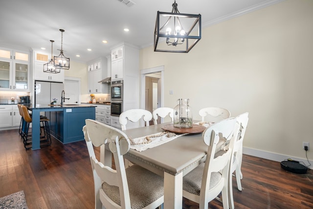 174 Rs County Road 3160, Emory, TX 75440 - dining space with a chandelier, ornamental molding, recessed lighting, dark wood-style floors, and baseboards