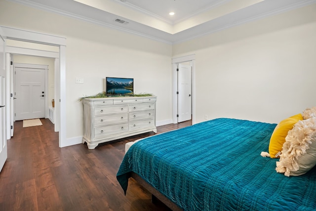 174 Rs County Road 3160, Emory, TX 75440 - bedroom with dark wood-type flooring, ornamental molding, baseboards, recessed lighting, and a raised ceiling