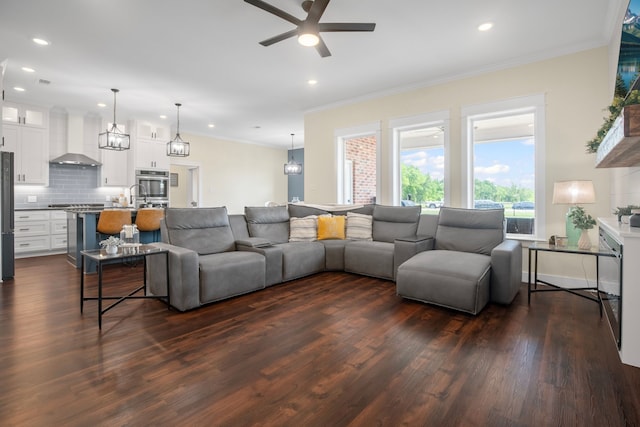 174 Rs County Road 3160, Emory, TX 75440 - living room featuring dark wood-type flooring, ceiling fan, ornamental molding, and recessed lighting