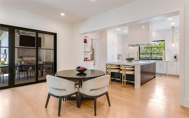 3713 Greenbrier Dr, University Park, TX 75225 - dining area featuring light wood finished floors and recessed lighting