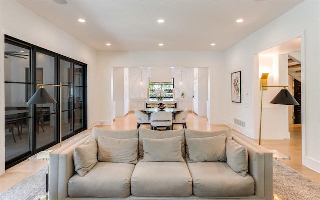 3713 Greenbrier Dr, University Park, TX 75225 - living room with recessed lighting, light wood-style flooring, and baseboards