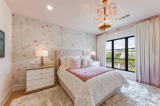 3713 Greenbrier Dr, University Park, TX 75225 - bedroom featuring a chandelier, wallpapered walls, baseboards, wood finished floors, and recessed lighting