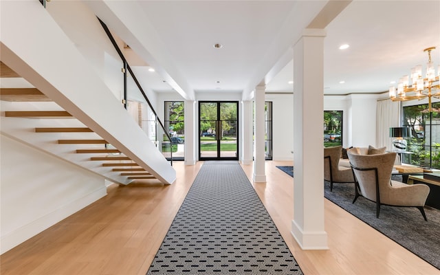 3713 Greenbrier Dr, University Park, TX 75225 - entryway with decorative columns, light wood-type flooring, stairway, baseboards, and recessed lighting