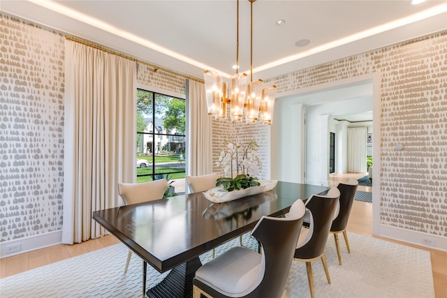3713 Greenbrier Dr, University Park, TX 75225 - dining room with a chandelier, baseboards, light wood-style floors, and wallpapered walls