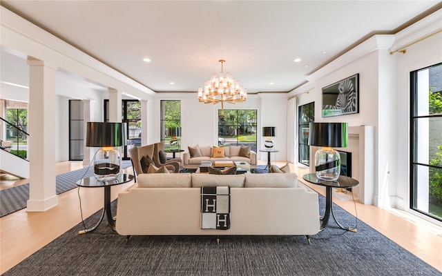 3713 Greenbrier Dr, University Park, TX 75225 - living room featuring healthy amount of natural light, wood finished floors, a chandelier, and recessed lighting
