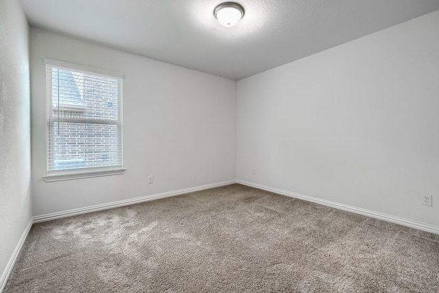 1316 Renoir Dr, Little Elm, TX 75068 - carpeted empty room with baseboards