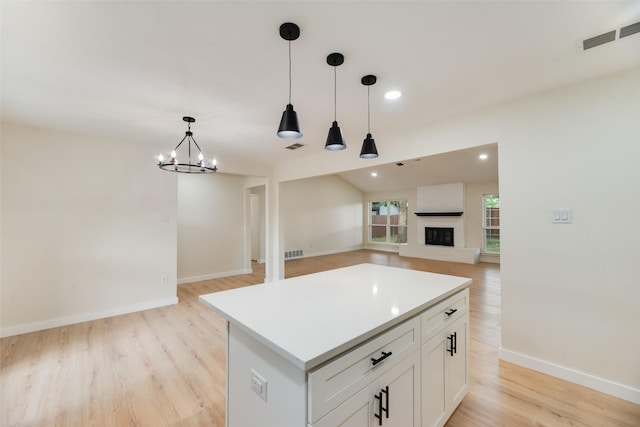 3011 Sunnybrook Ln, Arlington, TX 76014 - kitchen featuring open floor plan, light wood-type flooring, decorative light fixtures, baseboards, and recessed lighting