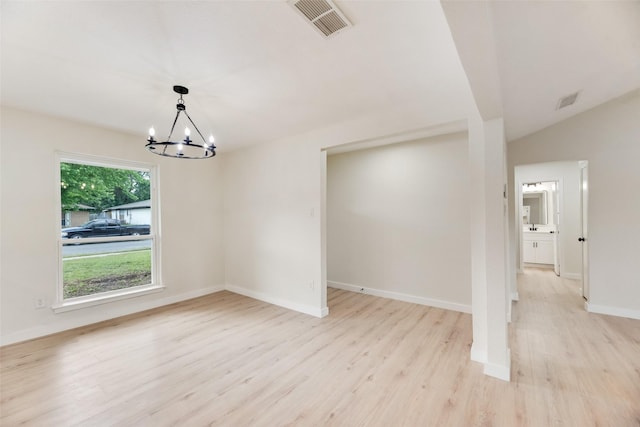 3011 Sunnybrook Ln, Arlington, TX 76014 - unfurnished dining area featuring a chandelier, light wood-type flooring, and baseboards