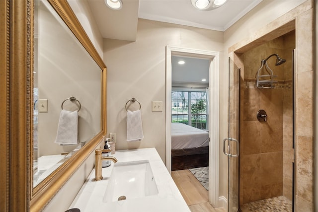 7008 Joyce Way, Dallas, TX 75225 - ensuite bathroom with a stall shower, crown molding, and vanity