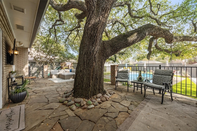 7008 Joyce Way, Dallas, TX 75225 - view of patio / terrace featuring a fenced backyard and outdoor lounge area