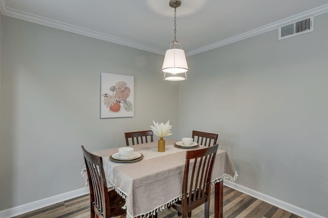15151 Berry Trl Unit 401, Dallas, TX 75248 - dining room with wood finished floors, crown molding, and baseboards
