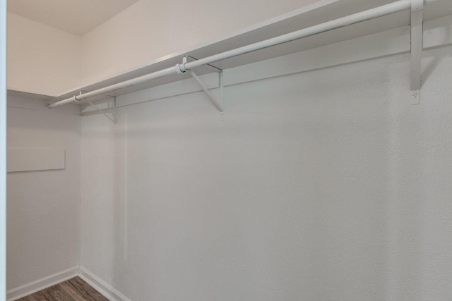 15151 Berry Trl Unit 401, Dallas, TX 75248 - walk in closet with wood finished floors