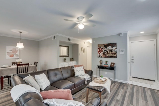 15151 Berry Trl Unit 401, Dallas, TX 75248 - living area with a ceiling fan, ornamental molding, and carpet flooring