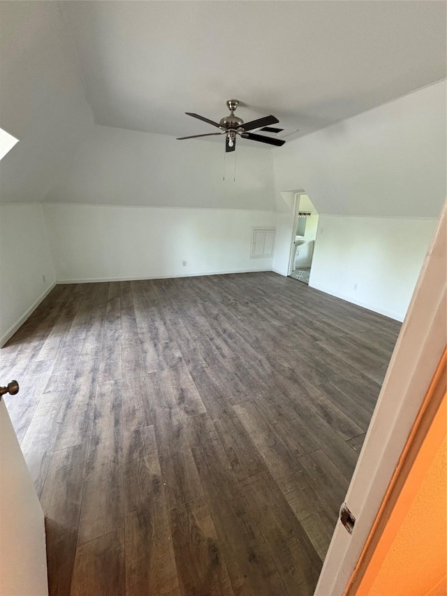 401 S Bois D Arc St, Forney, TX 75126 - additional living space with vaulted ceiling, dark wood-style flooring, and ceiling fan