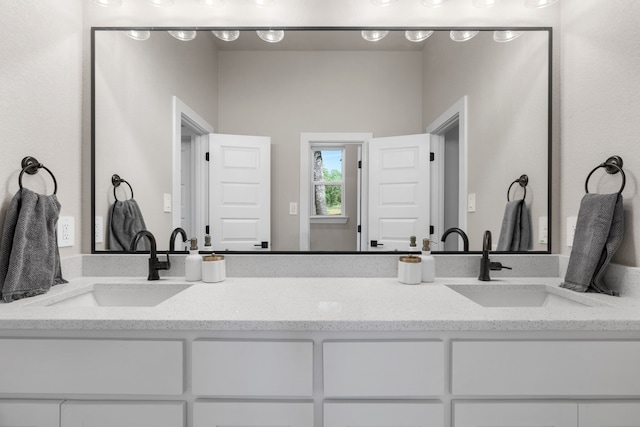 bathroom with double vanity