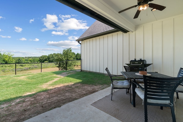 view of patio featuring ceiling fan and outdoor dining space