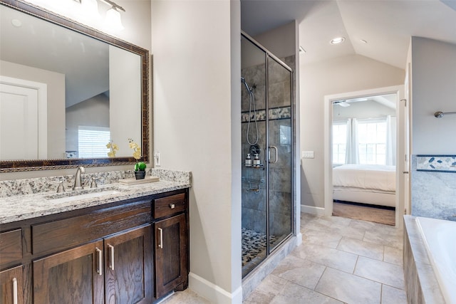 4100 Emerson Ave Unit 8, University Park, TX 75205 - bathroom with a stall shower, healthy amount of natural light, vaulted ceiling, and vanity
