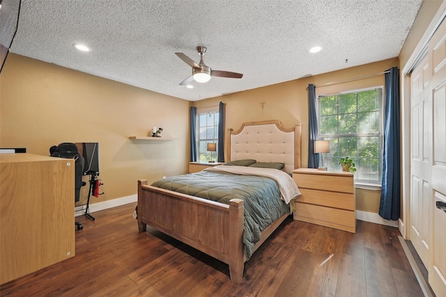 4524 Rosedale Dr, Grand Prairie, TX 75052 - bedroom featuring a textured ceiling, baseboards, wood finished floors, recessed lighting, and ceiling fan